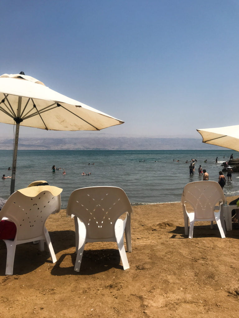 Kalia Beach on the Dead Sea: Beach umbrella and beach chairs looking over the mineral-rich water. 